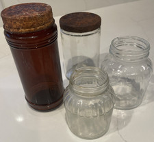 4 Vintage Glass Food Jars 1 Amber Colored, 2 W/Lids
