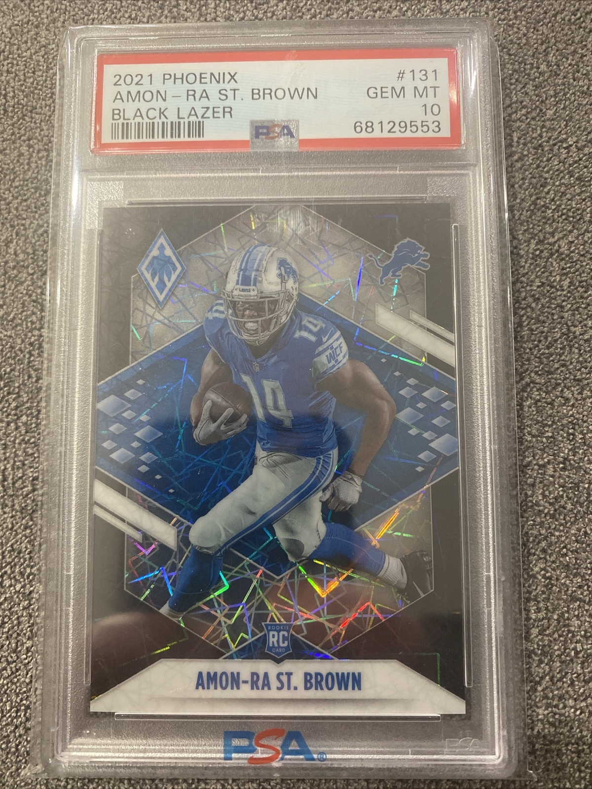 Amon-Ra St. Brown Panini Phoenix #131 Black Lazer