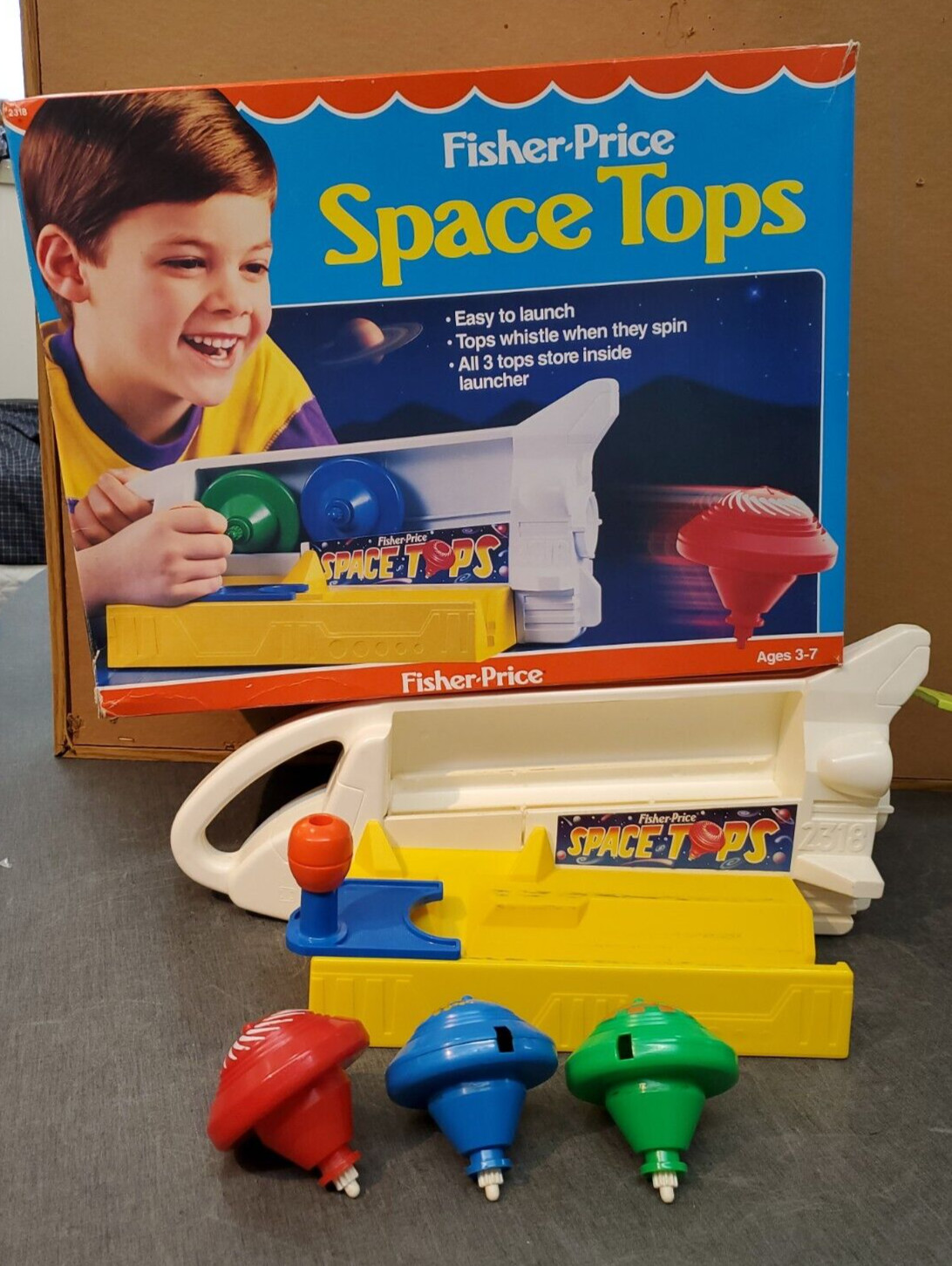 Fisher Price Space Tops Juguete Spinning Top Cohete Transbordador Nave Espacial 1988 con CAJA