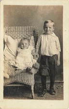 Siblings Portrait Boy And Infant In A Chair 1910s RPPC Postcard