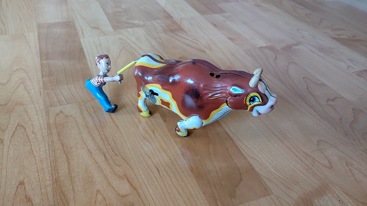 Mechanical Wild Roaring Bull and Boy Windup Tin Toy - Mikuni