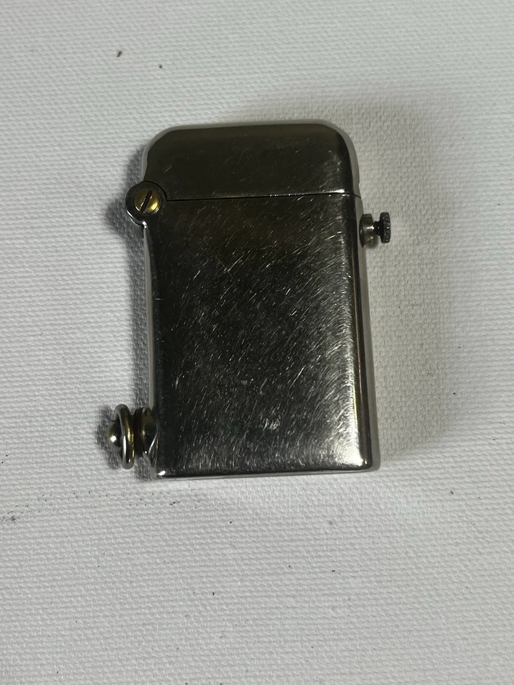Encendedor Thorens vintage hecho en Suiza con patrón cromado de una sola garra Foto 3 de 4
