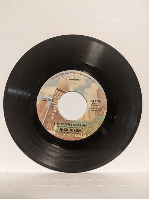 45 ~NICK NIXON: ''She's Just an Old Love Turned Memory / It's Much Too Rainy''  VG