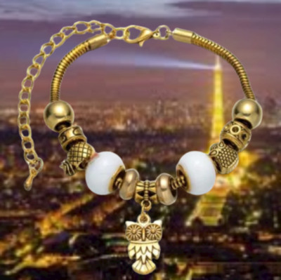 Armband - Keramikperlen - Eulenperlen - Schildkröte und Eulenanhänger. 