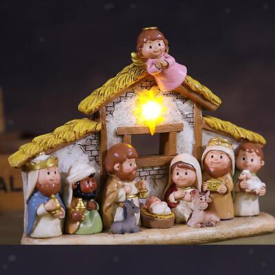 Weihnachtskrippendeko mit Cartoonfiguren aus
