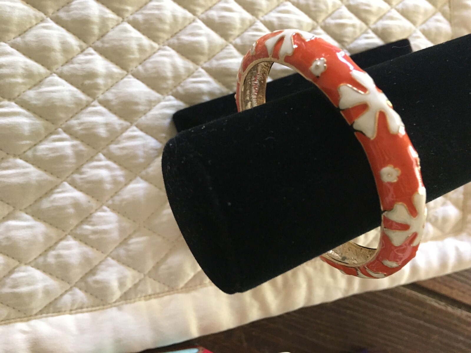 Enamel orange & white floral thin bangle w gold tone inside generous opening