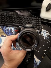 Nikon D3100 Digital SLR Camera Bundle - 18-55mm 55-200mm Lenses, Bag