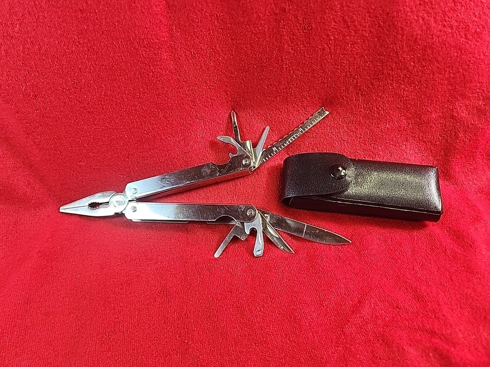 12-in-1 Multi-Tool Kit with Pliers, Knife, Bottle Opener & Ruler in Case  