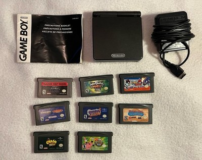 Nintendo game boy advance SP model AGS   001 and 8 games