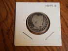 `1899 O Barber Quarter, good condition, 90 % silver