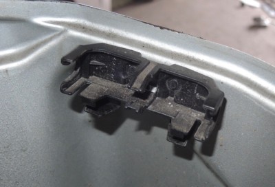 Holder bracket front right engine compartment W124 Mercedes S124 E class plastic