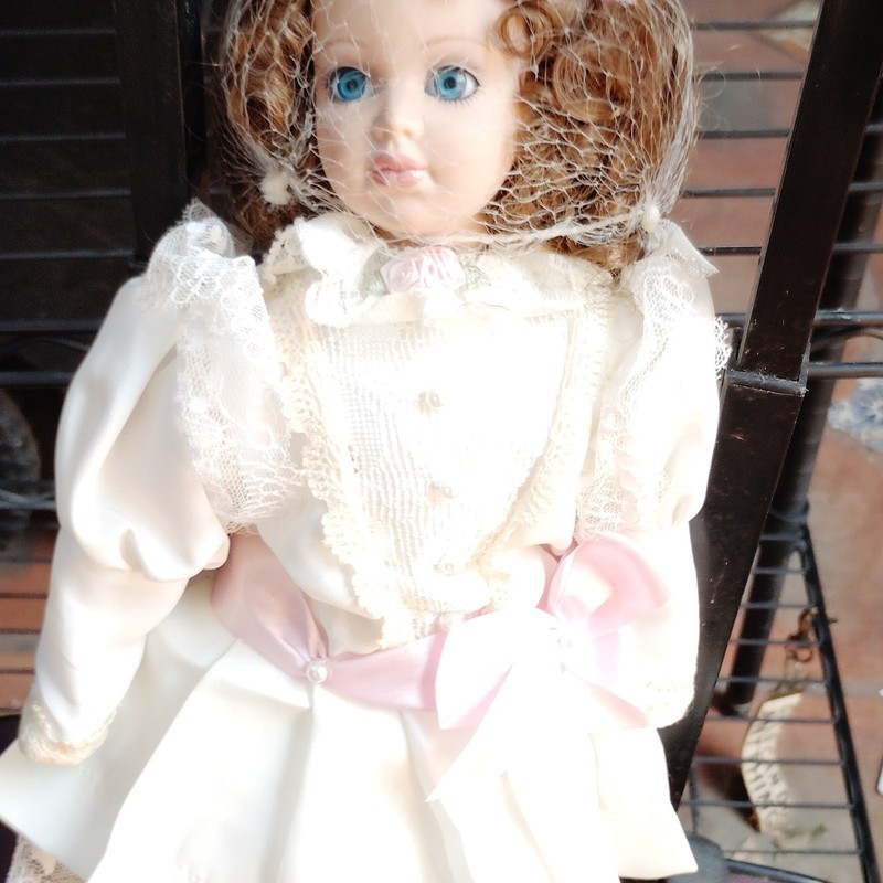 Porcelain Girl Doll Blue Eyes Brown Curly Hair White Dress Pink Ribbon