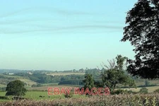 PHOTO  VIEW FROM THE A366 THE WATER TOWER NEAR PIPEHOUSE IS ON THE HORIZON TO TH