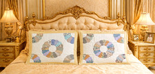 Two quilted patchwork pillow shams, 20" 26"