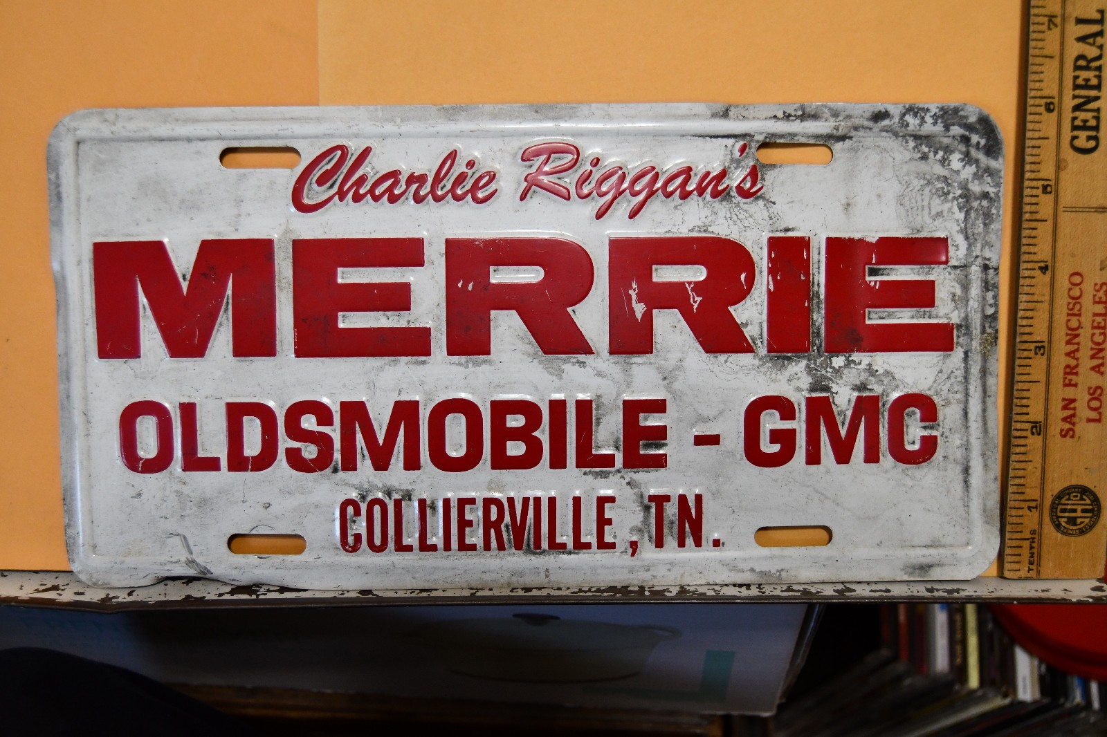 Vintage License Plate Tag Charlie Riggan Merrie Oldsmobile GMC Collierville TN