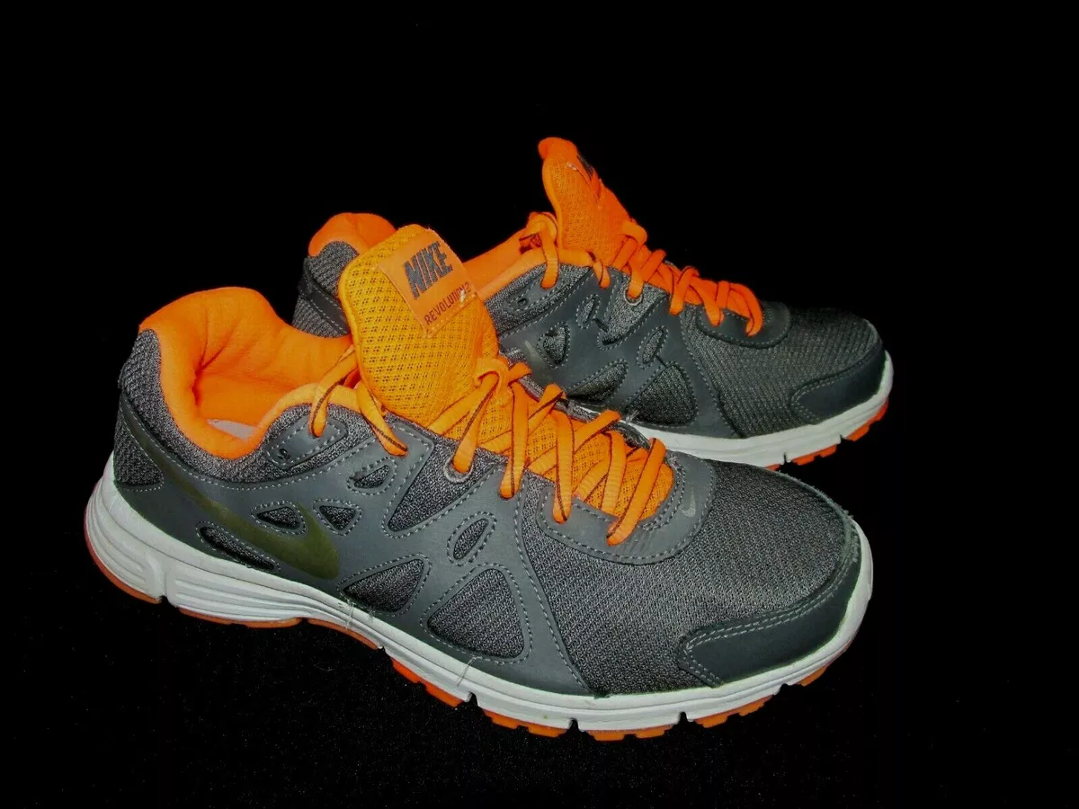 Nike revolution orange clearance