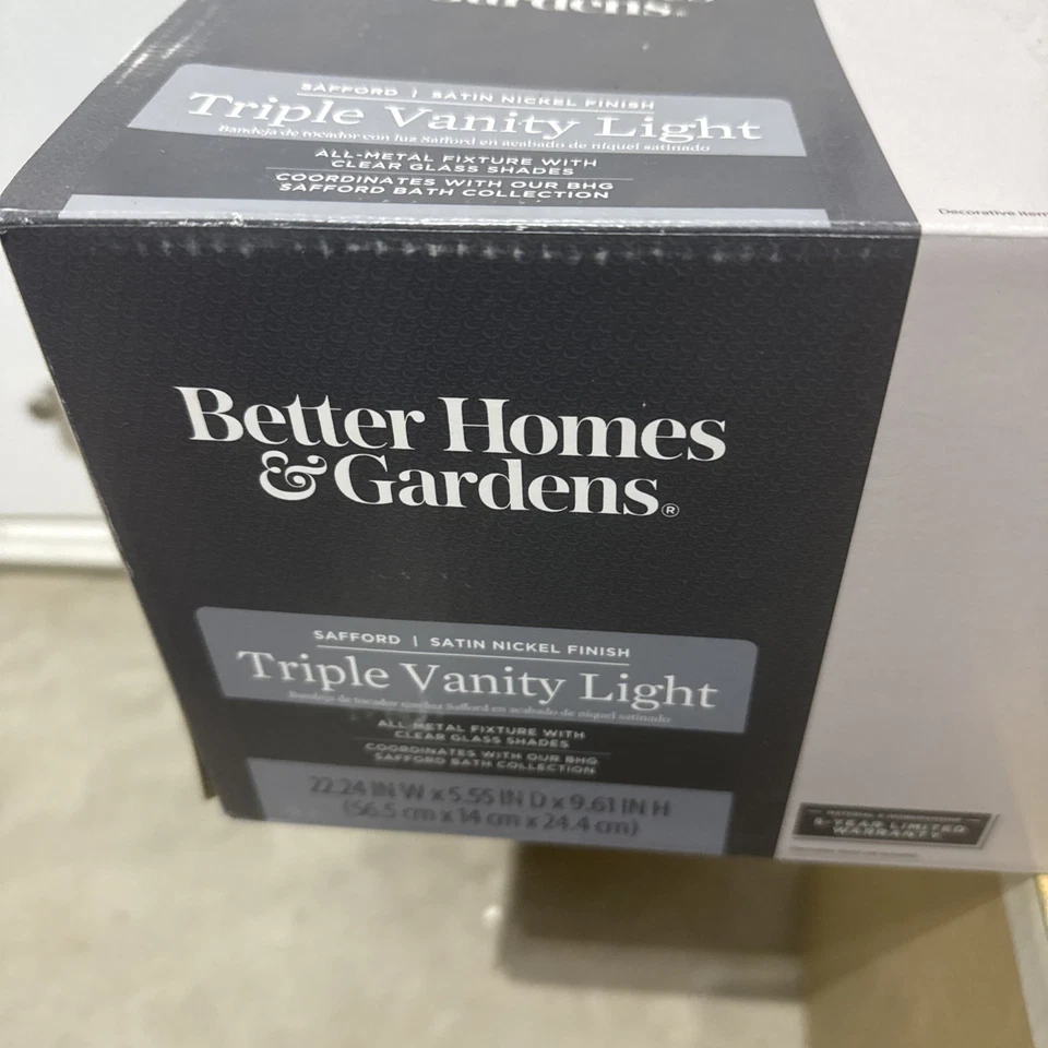 Luz de tocador triple interior Better Homes & Gardens (acabado bronce oscuro) Holbrook Foto 2 de 3