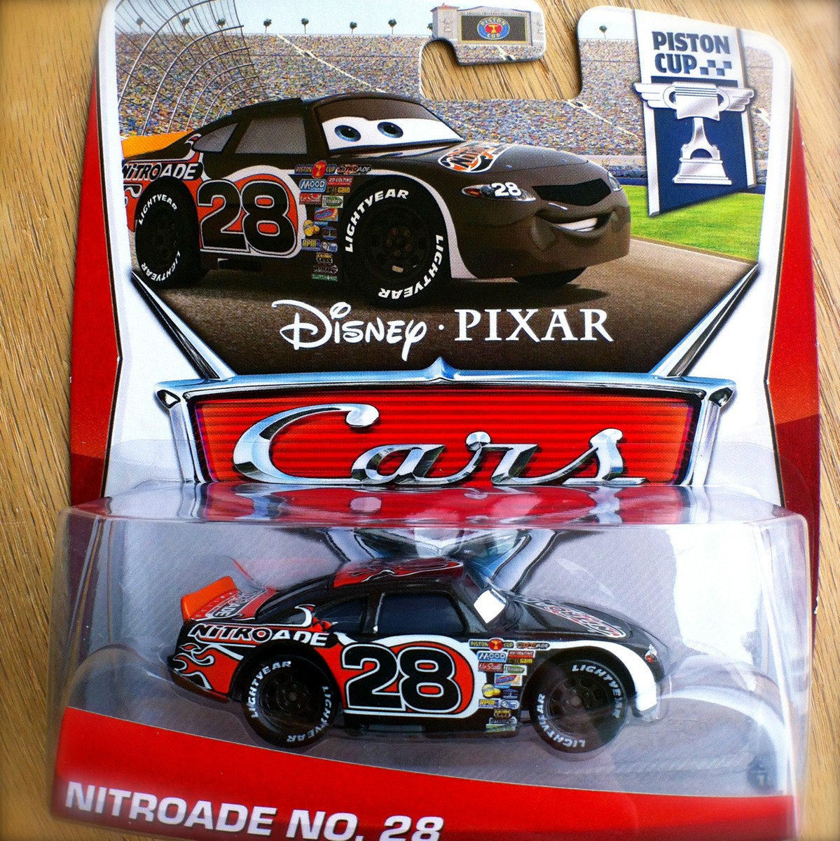 Disney PIXAR Cars NITROADE NO. 28 on 2013 PISTON CUP THEME CARD