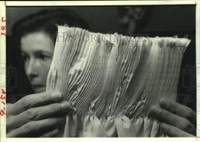 1985 Press Photo Woman holds example of fabric smocking - hcx30082