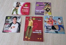 Zumba Fitness DVD Lot of 4 + Guide Book – Live & Flat Abs Sealed!