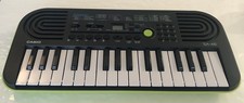 NEW OOB Casio SA-46 32-Key Mini Electronic Keyboard Black & Green + Batteries
