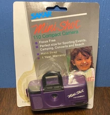 VINTAGE Sakar 110 Film Micro Mini Shot Travel Handheld Camera PURPLE - NEW NOS
