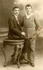 #65917 CAIRO 1930s. Two young men, Greeks. Background. RPPC KARAPATSOPOULOS