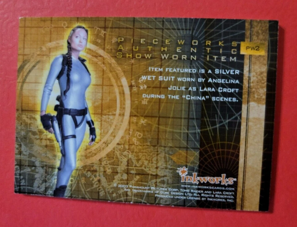 ANGELINA JOLIE TOMB RAIDER LARA CROFT WORN SILVER WET SUIT COSTUME RELIC CARD 03 - Image 2 of 2