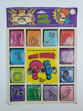 Vintage Magic Puzzles Metal Ring Puzzle 12 different Hong Kong Brain Teaser Toy