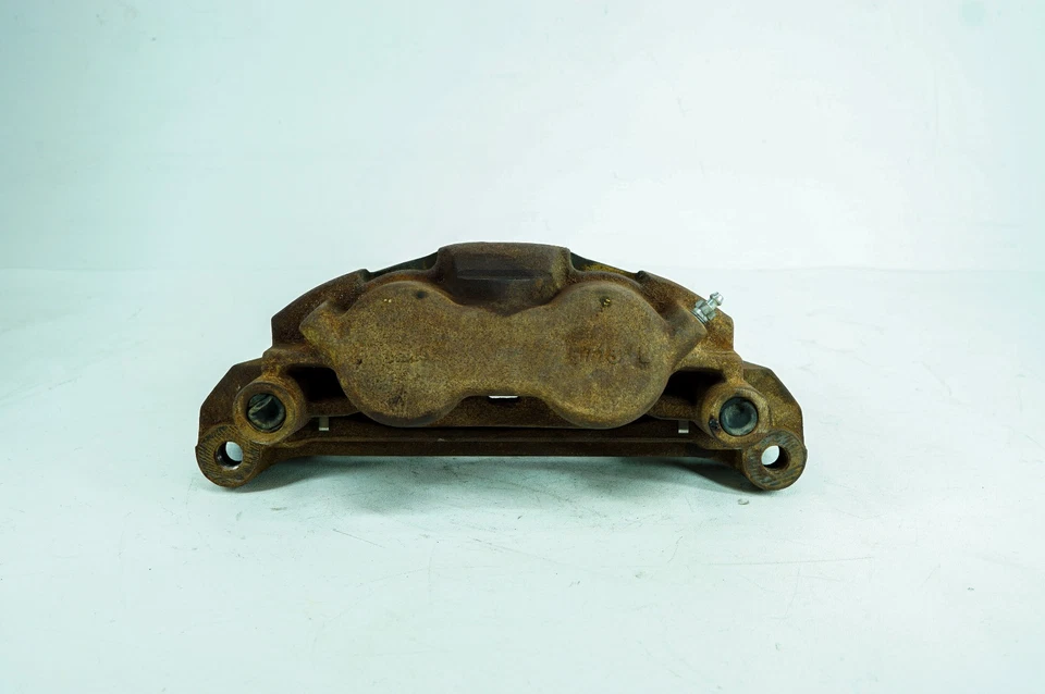 Soporte pinza freno conductor delantero izquierdo Nissan Titan XD 16-19 OEM 5116 Foto 2 de 4