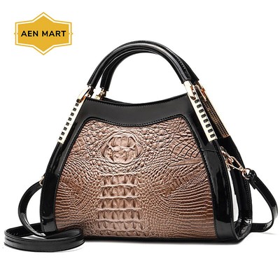 crocodile print shoulder bolsa