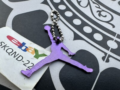 purple nike keychain