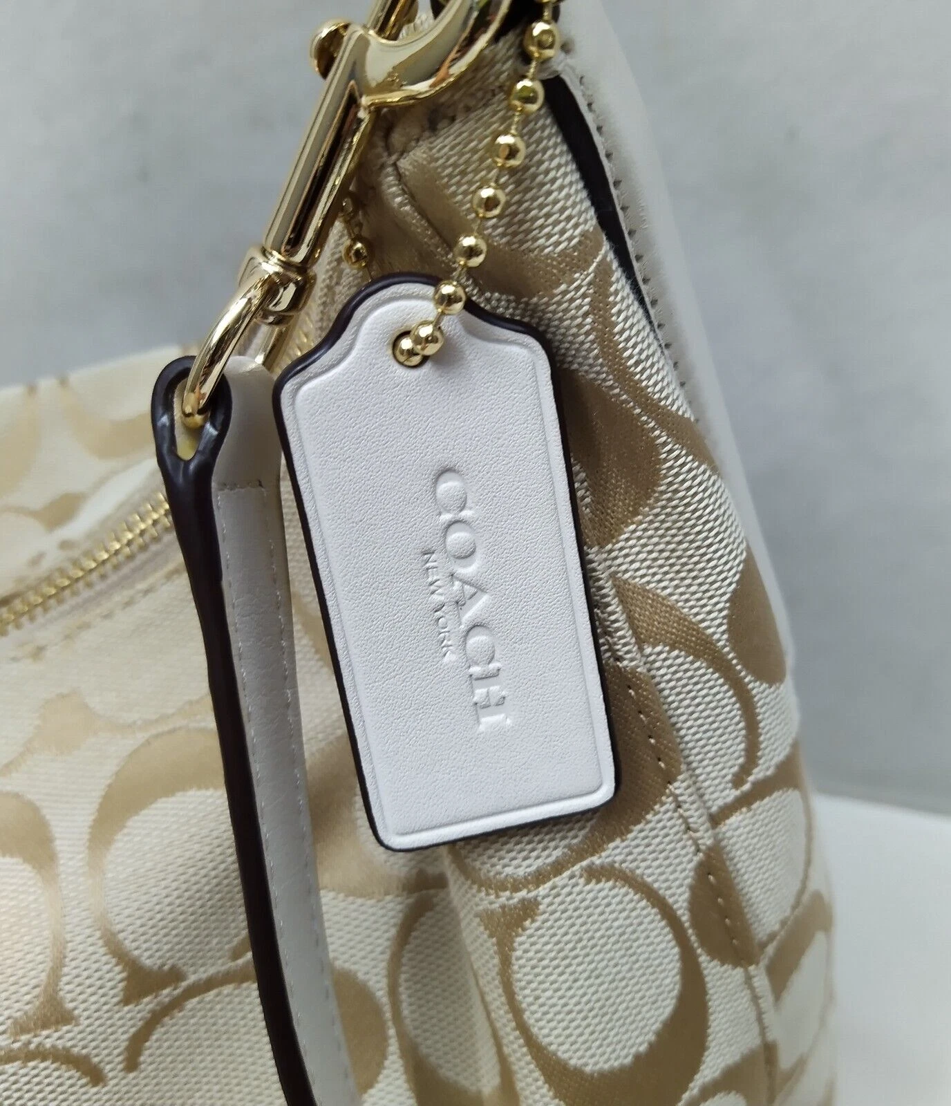 Borsa a tracolla Coach Signature marrone chiaro tela bordo pelle cerniera