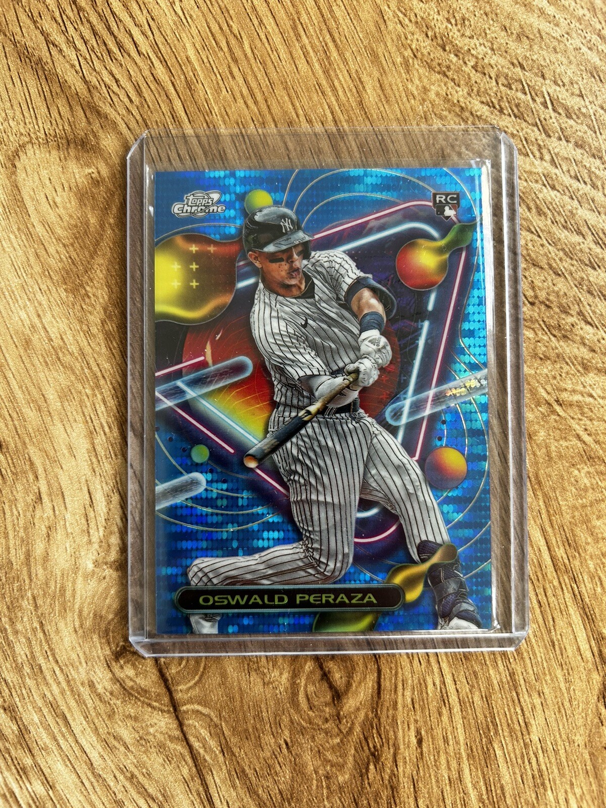 2023 Topps Cosmic Chrome Oswald Peraza #84 Blue Moon Rookie Refractor /99