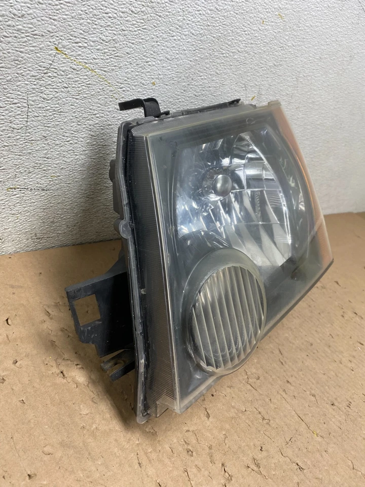 Faro lateral izquierdo izquierdo conductor Nissan Xterra 2005-2015 J6552 TYC DG Foto 2 de 4