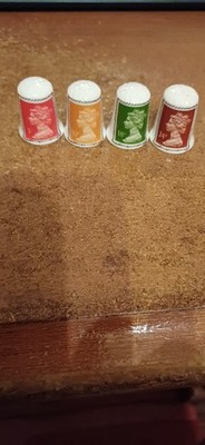 4no China Thimbles Which Shows Pictures Of Different Stanp Values & By Stoke Co.