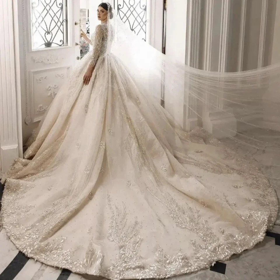 Vestidos de novia de princesa de lujo con apliques de encaje manga larga cuello en V Foto 2 de 4