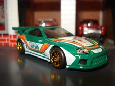 TOYOTA SUPRA 711 LIVREA CUSTOM EDITION 1/64 HW RAGGI ORO E PNEUMATICI REAL RIDER