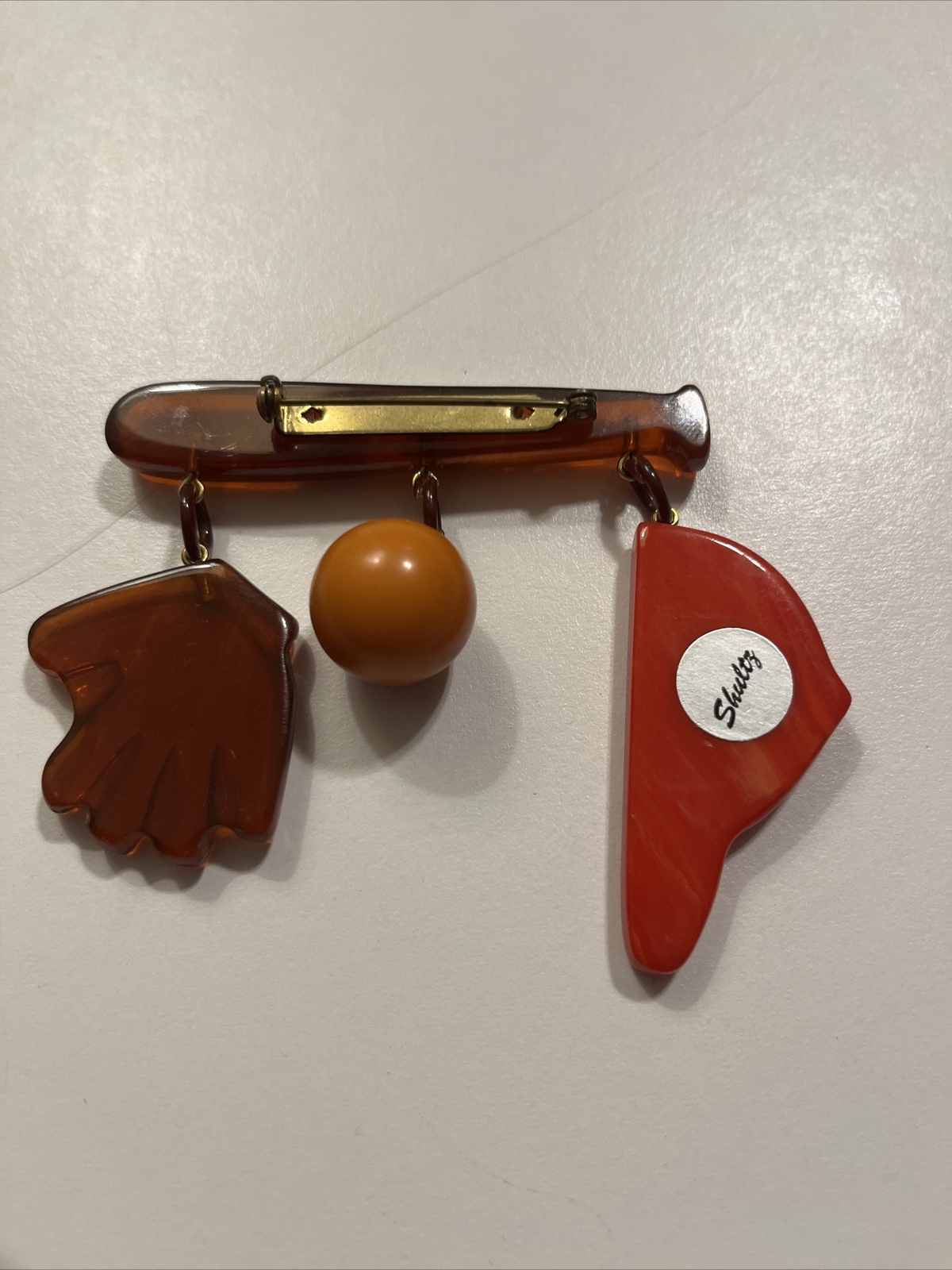 SUPER RARE VINTAGE SHULTZ BAKELITE BASEBALL BROOCH SIGNED