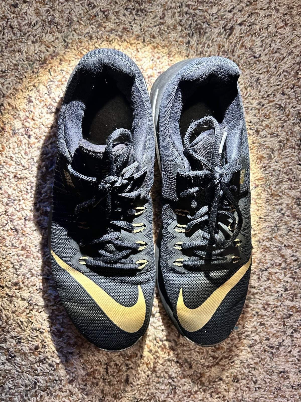 In A Black And Metallic Gold Colorway