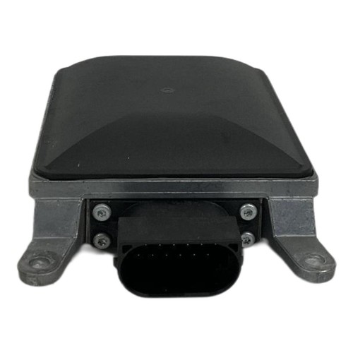 Black 2020 Porsche Macan right passenger blind spot radar with antenna, wiring, and mounting points.