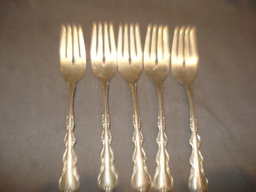 5 INTERNATIONAL STERLING SALAD FORKS IN THE ANGELIQUE PATTRERN 6 1/2 INCHES