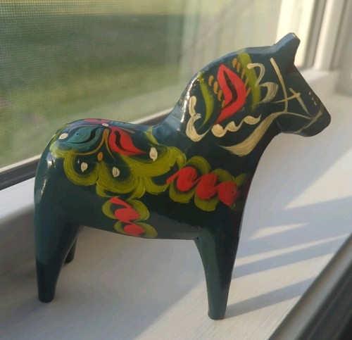 Traditional Swedish Dala Horse  Dalahäst  Painted In Many Colors Seen From The Side Against White Background Image543266537