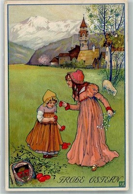 10738902 - Ostern Zwei Kinder mit Ostereiern auf einer Wiese vor dem Dorf