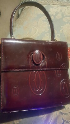 MUST DE CARTIER AUTHENTIC BORDEAUX LEATHER MATERIAL.
