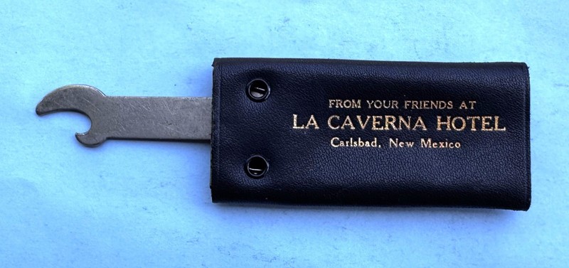 LA CAVERNA HOTEL CARLSBAD, NEW MEXICO ADVERTISING BOTTLE OPENER KEY HOLDER