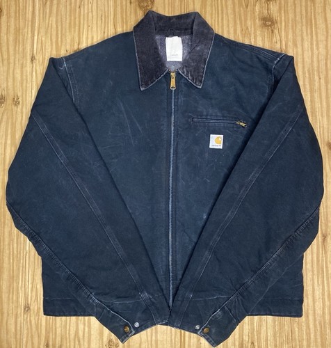 Black VTG Carhartt J01 BLK Detroit jacket size 46 with front zipper, collar, and white Carhartt logo patch on chest.