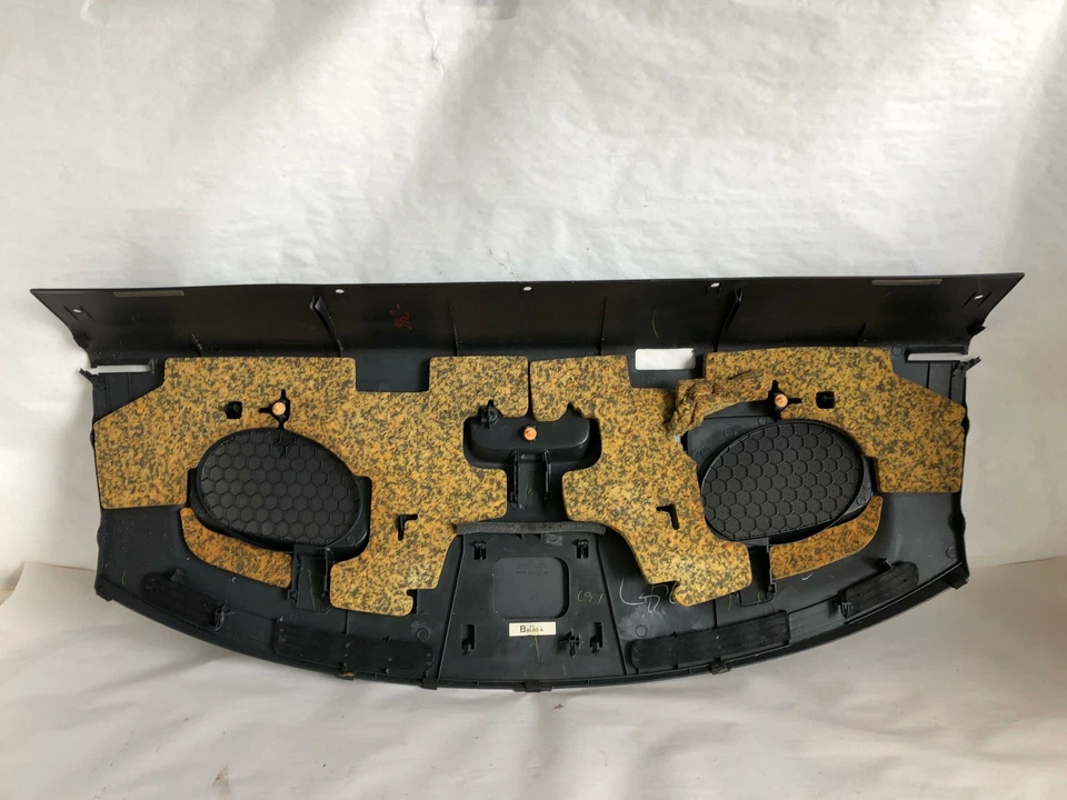 MAZDA PROTEGE 2003 Estante superior trasero del tablero Cubierta trasera del altavoz Panel de ajuste del tablero Ventilación Foto 3 de 4