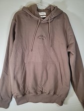 This taupe-colored pullover hoodie is the brand Public Supply and features XL
