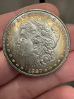 1887 $1 Morgan Silver Dollar UNC Toned